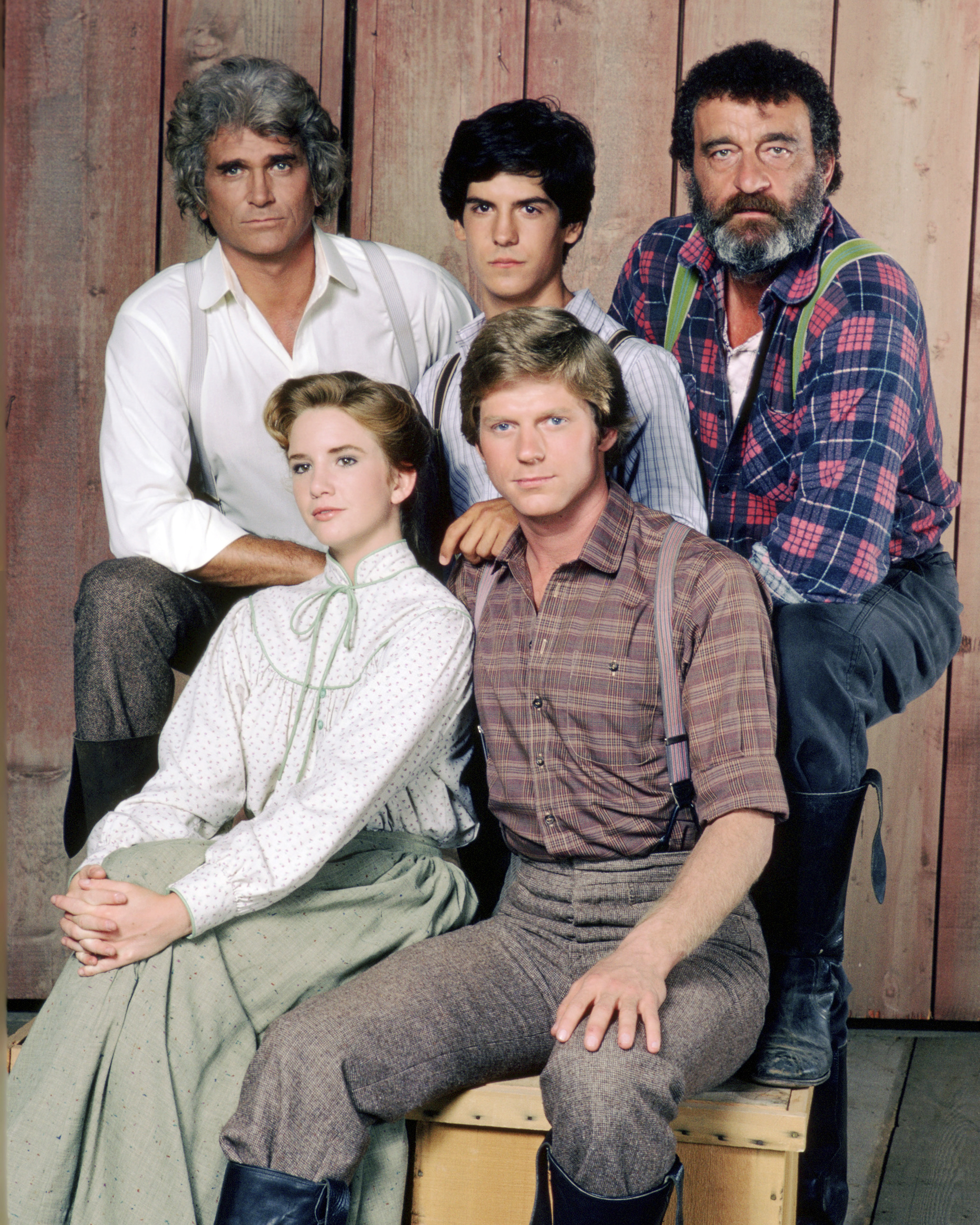 Michael Landon (1936 - 1991) as Charles Ingalls, Matthew Laborteaux as Albert Ingalls, Victor French as Isaiah Edwards, Dean Butler as Almanzo Wilder, and Melissa Gilbert as Laura Ingalls Wilder in the TV series "Little House on the Prairie," circa 1980 | Source: Getty Images