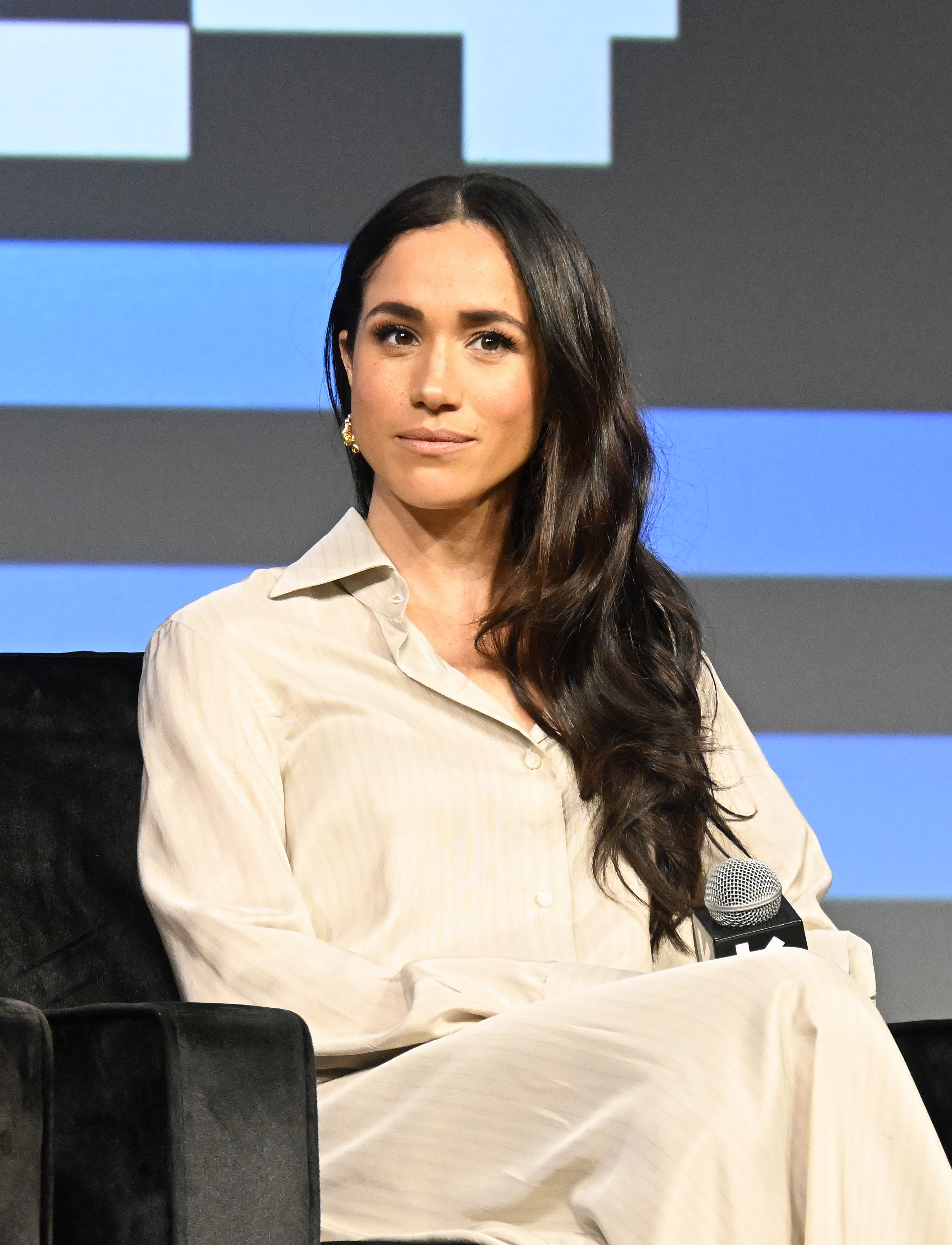 Meghan, Duchess of Sussex speaks onstage during the Breaking Barriers, Shaping Narratives: How Women Lead On and Off the Screen on March 8, 2024 | Source: Getty Images