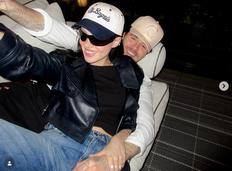 Brooklyn Beckham and Nicola Peltz cuddling on a sofa in a post dated April 29, 2025 | Source: Instagram/brooklynpeltzbeckham