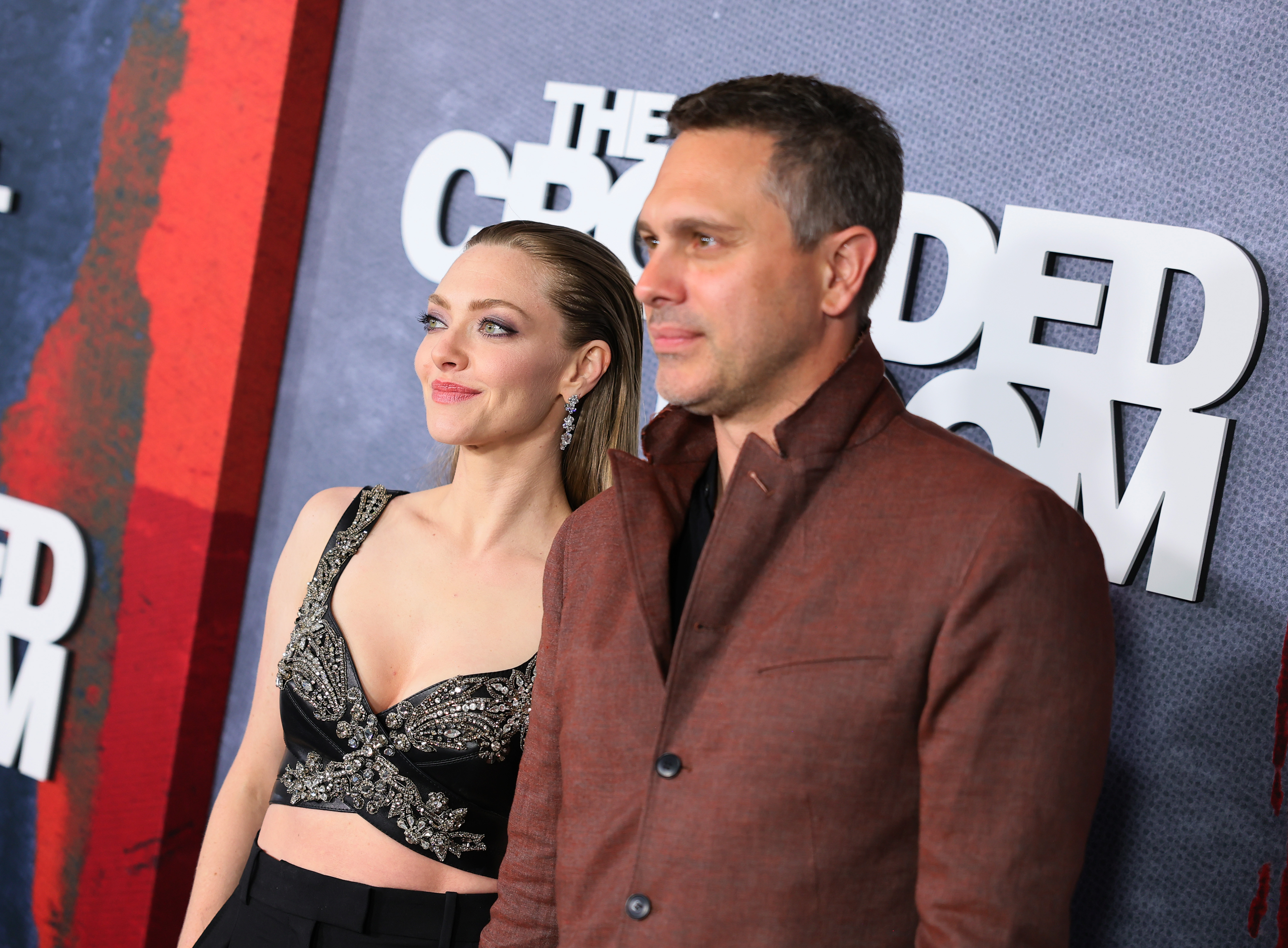 Amanda Seyfried and Thomas Sadoski at "The Crowded Room" red carpet on June 1, 2023, in New York. | Source: Getty Images
