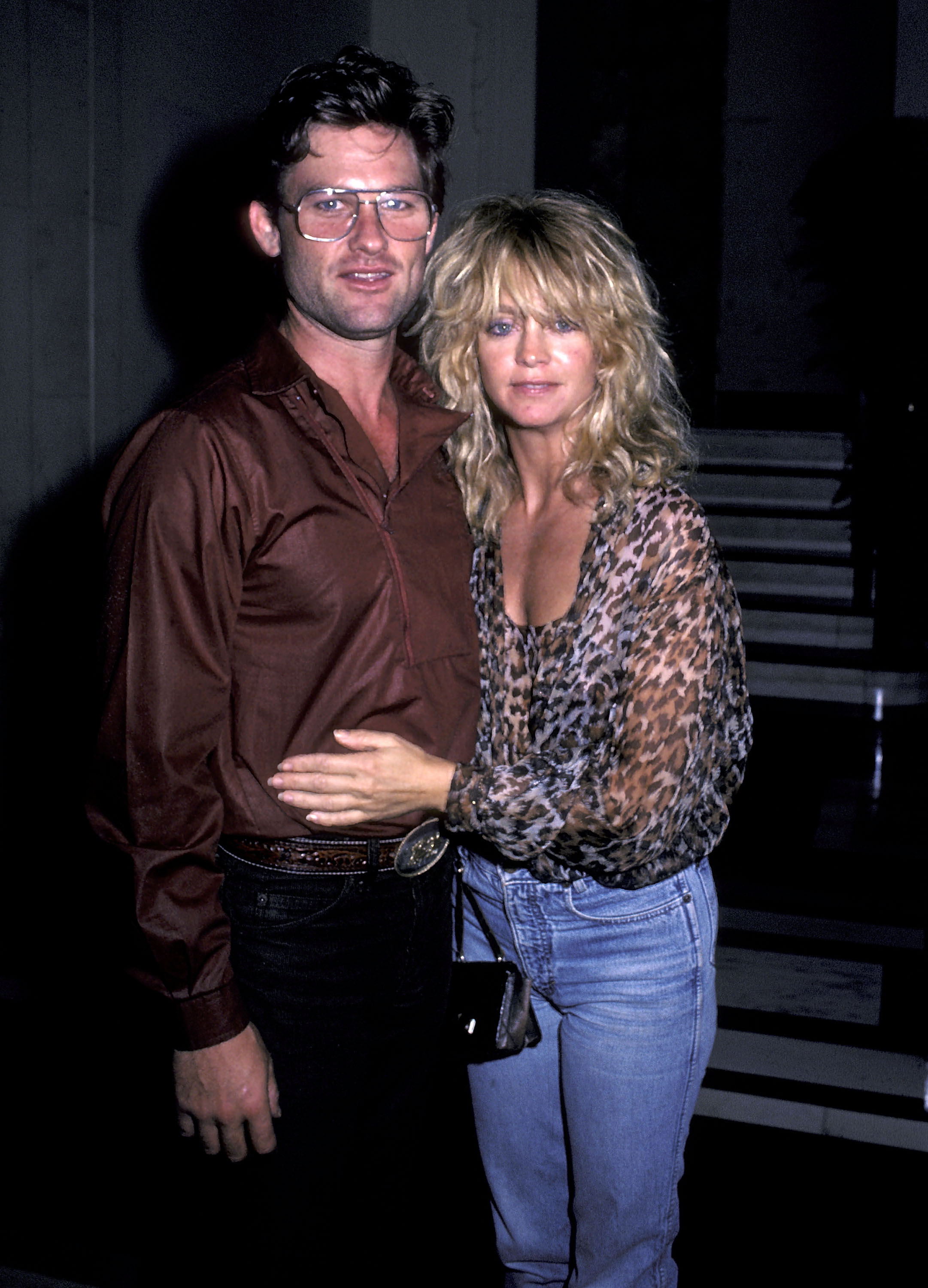 Kurt Russell and Goldie Hawn leave the Carlyle Hotel on July 23, 1983 | Source: Getty Images
