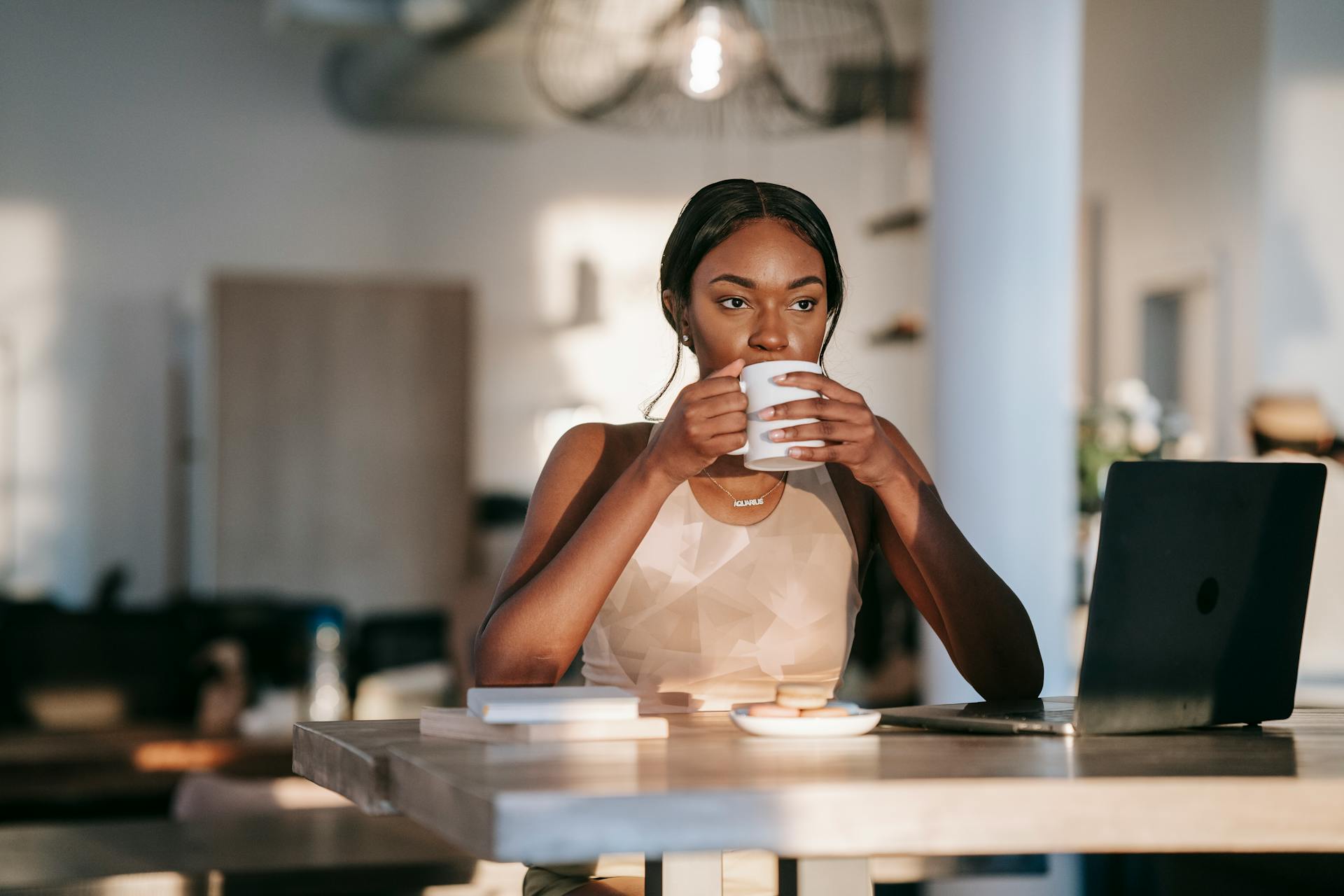 Woman drinking coffee | Source: Pexels