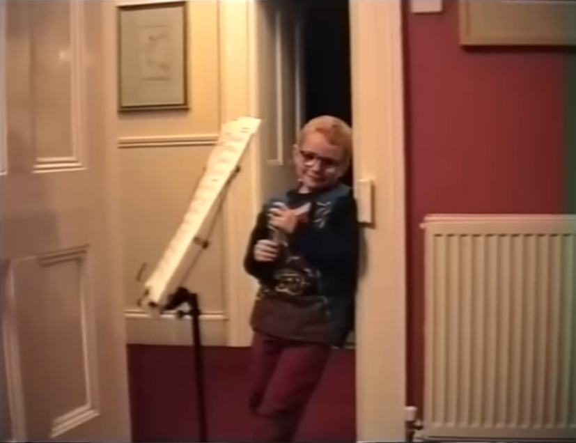 Young Ed Sheeran in his "Photograph" music video, published 10 May 2015. | Source: YouTube/Ed Sheeran