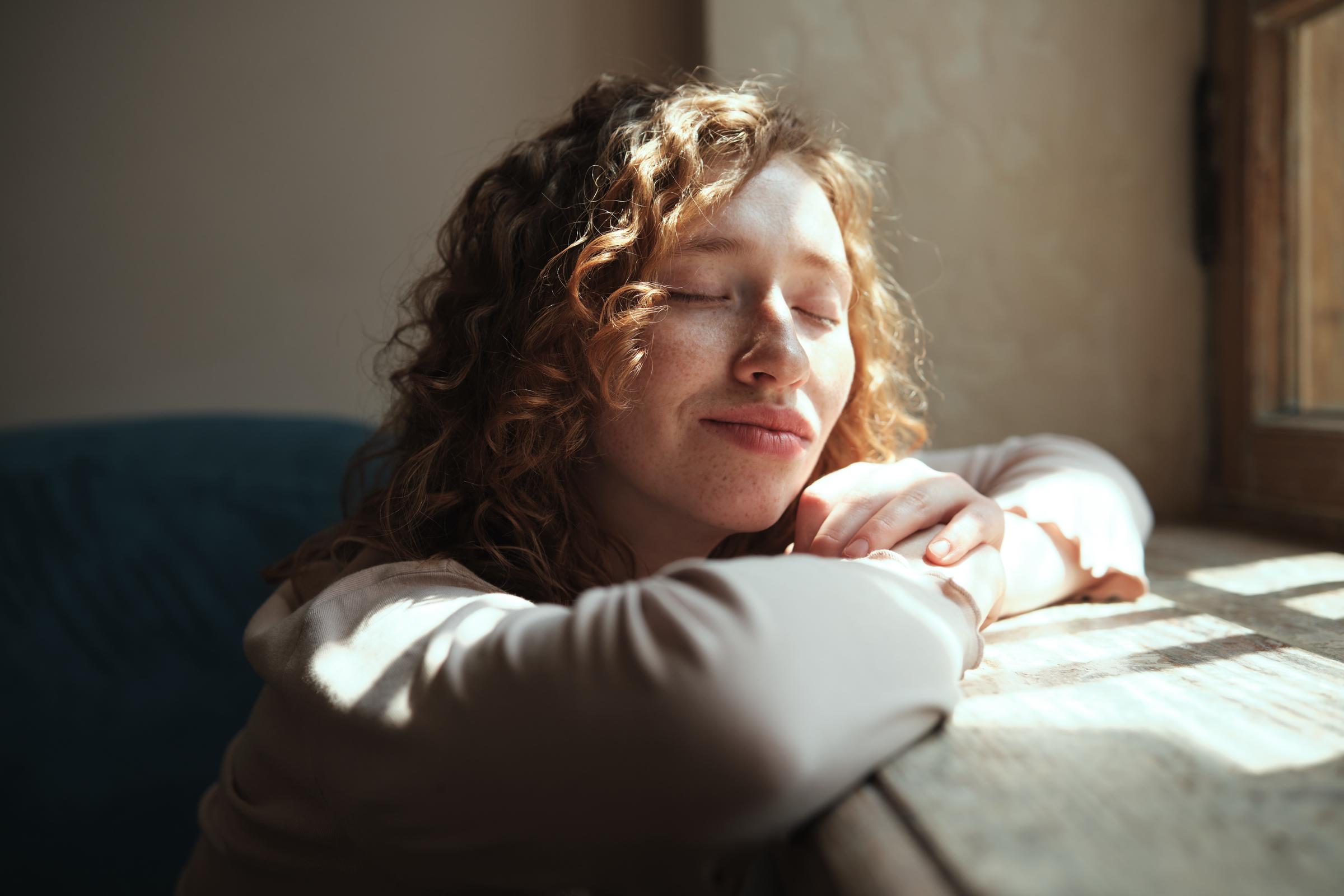 A woman enjoying the sunlight | Source: Getty Images