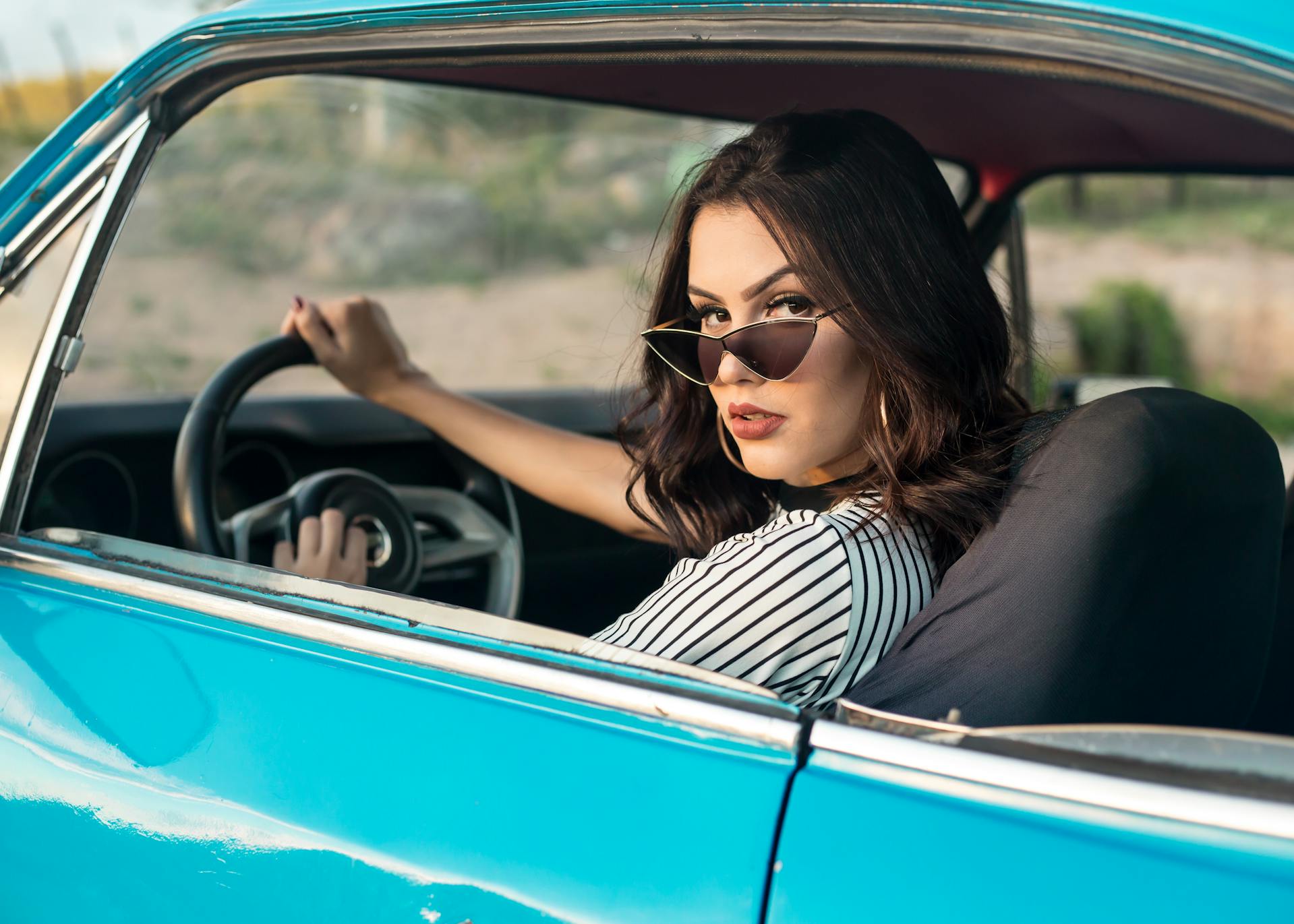 A woman driving | Source: Pexels