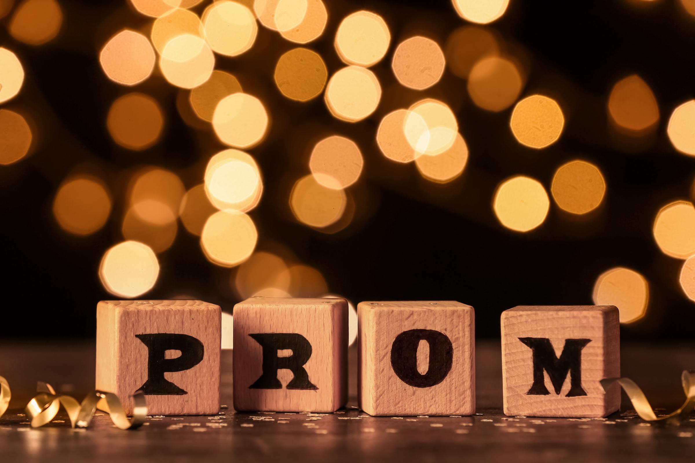 Wooden blocks spelliong 'PROM' | Source: Shutterstock