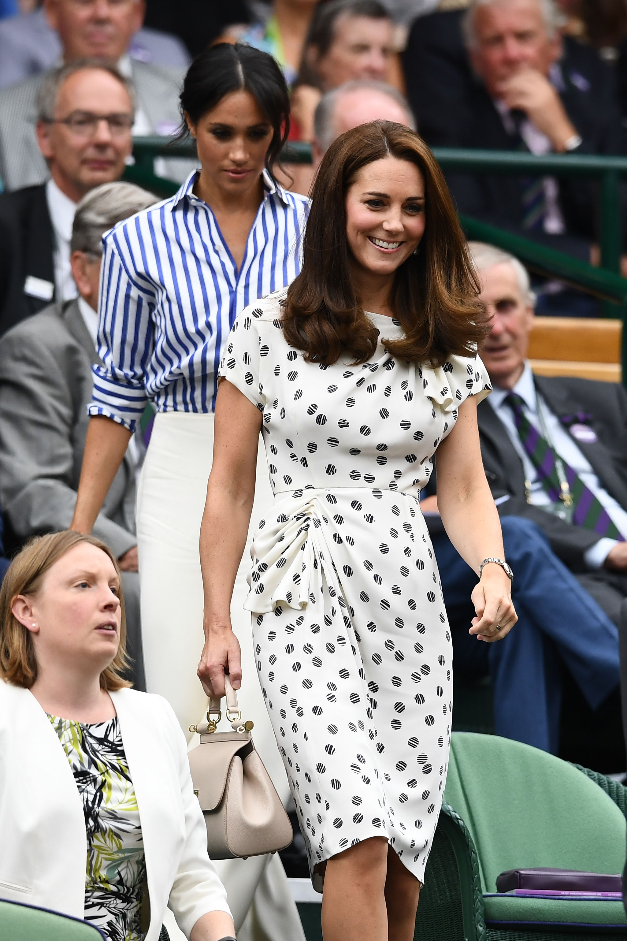 Meghan, Duchess of Sussex, and Catherine, Princess of Wales, on day 12 of the Wimbledon Championships at the All England Lawn Tennis and Croquet Club on July 14, 2018, in London. | Source: Getty Images