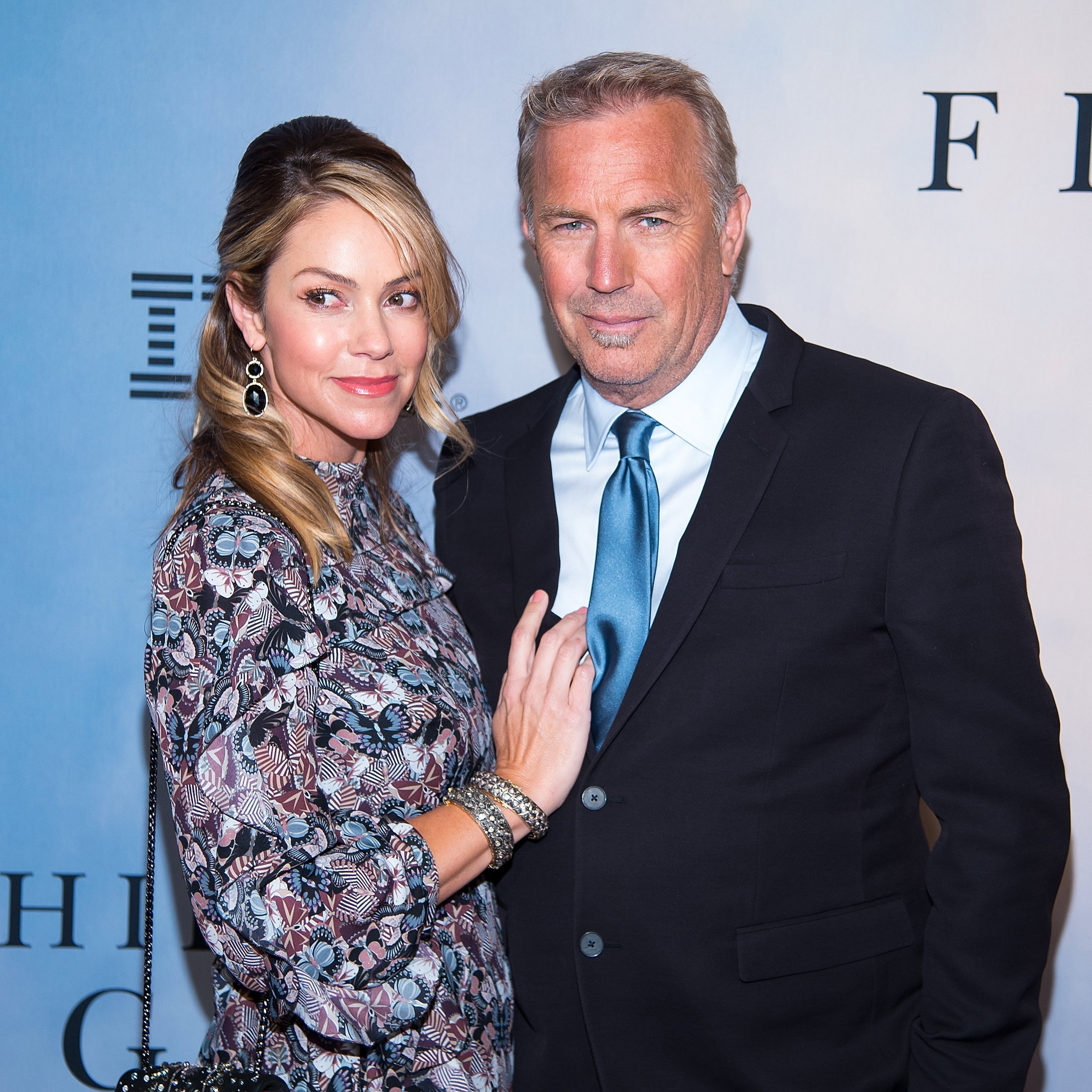 Christine Baumgartner and Kevin Costner attend the "Hidden Figures" New York special screening on December 10, 2016 | Source: Getty Images