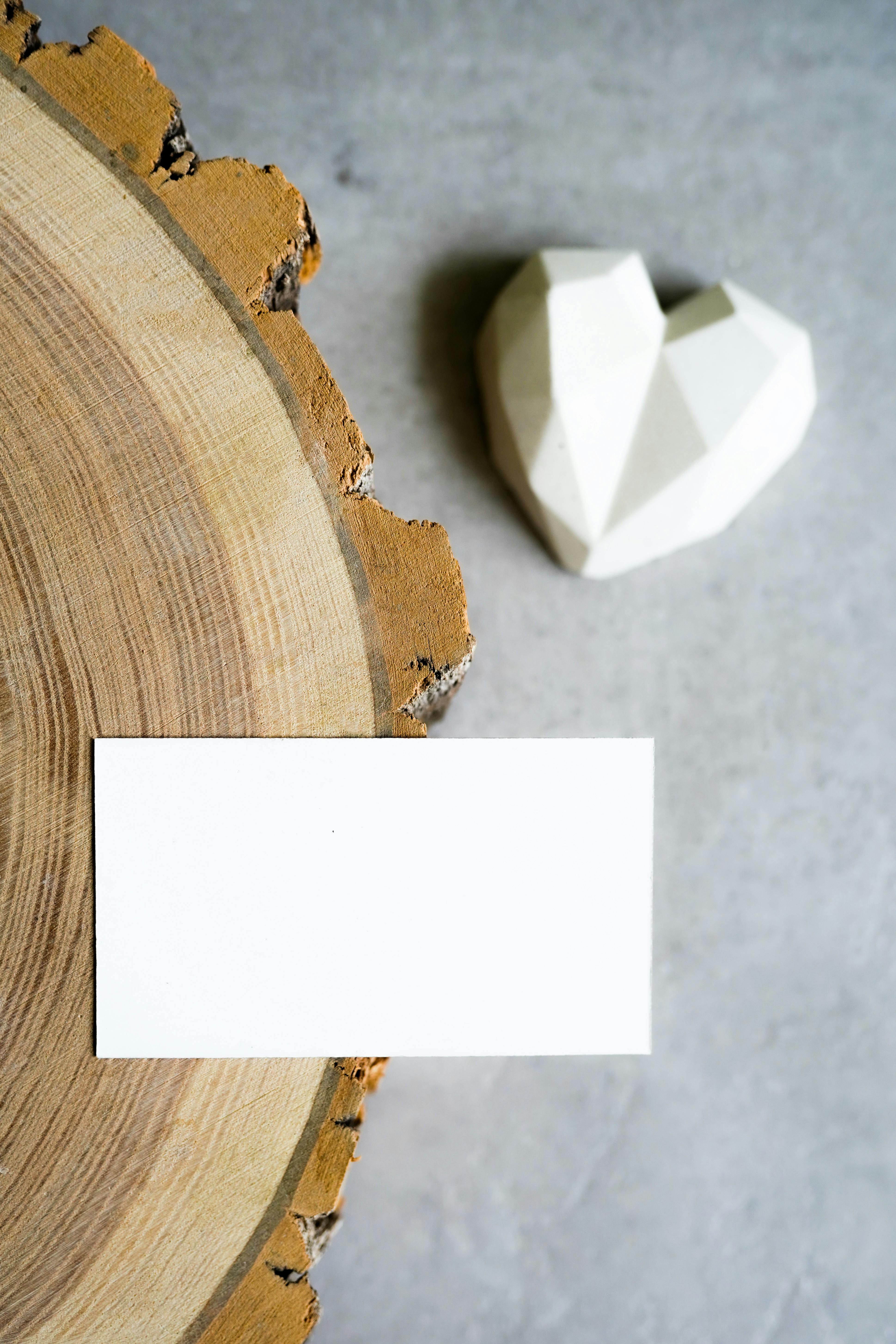 White paper on a wooden surface | Source: Pexels