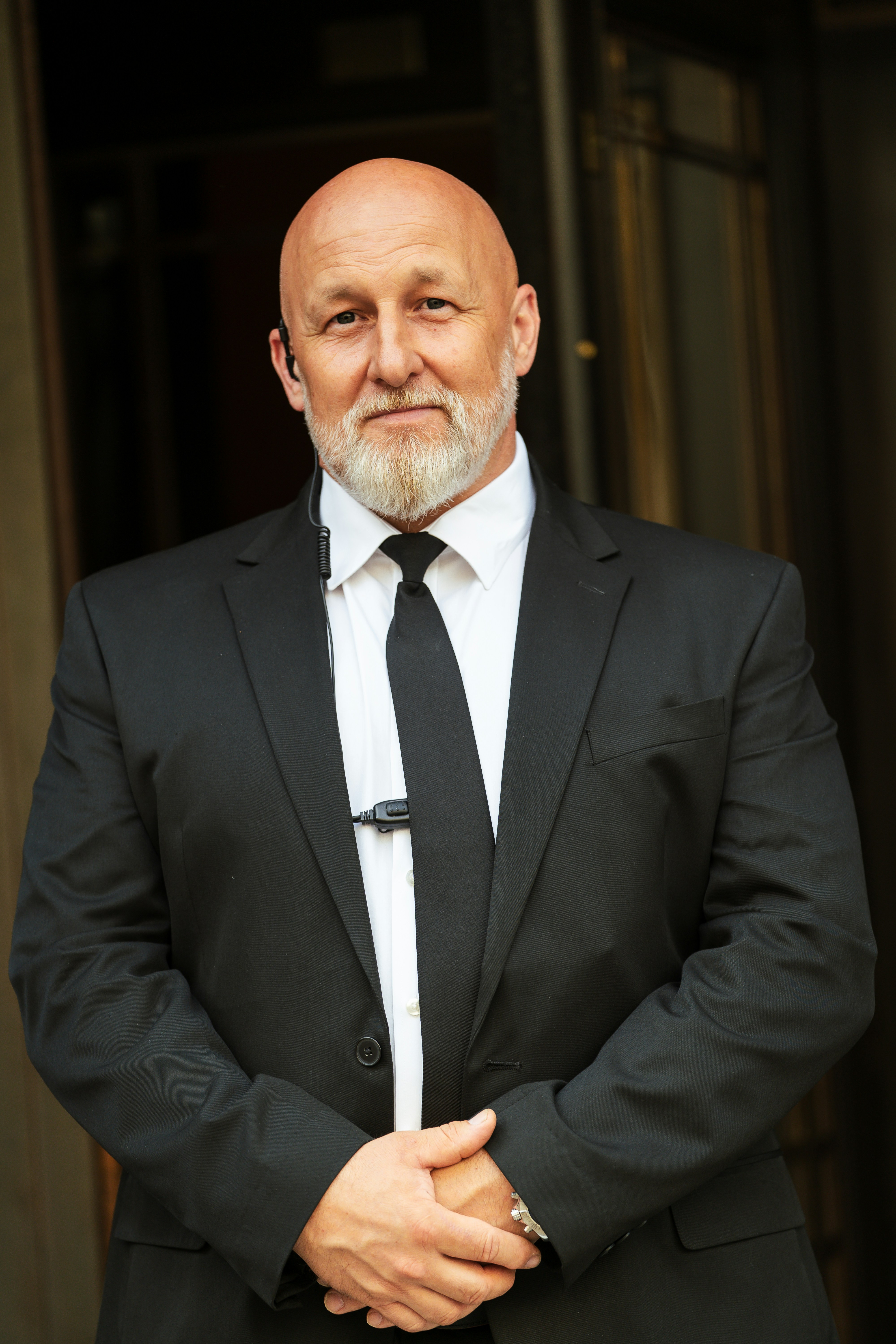 A man wearing a black suit and tie | Source: Unsplash