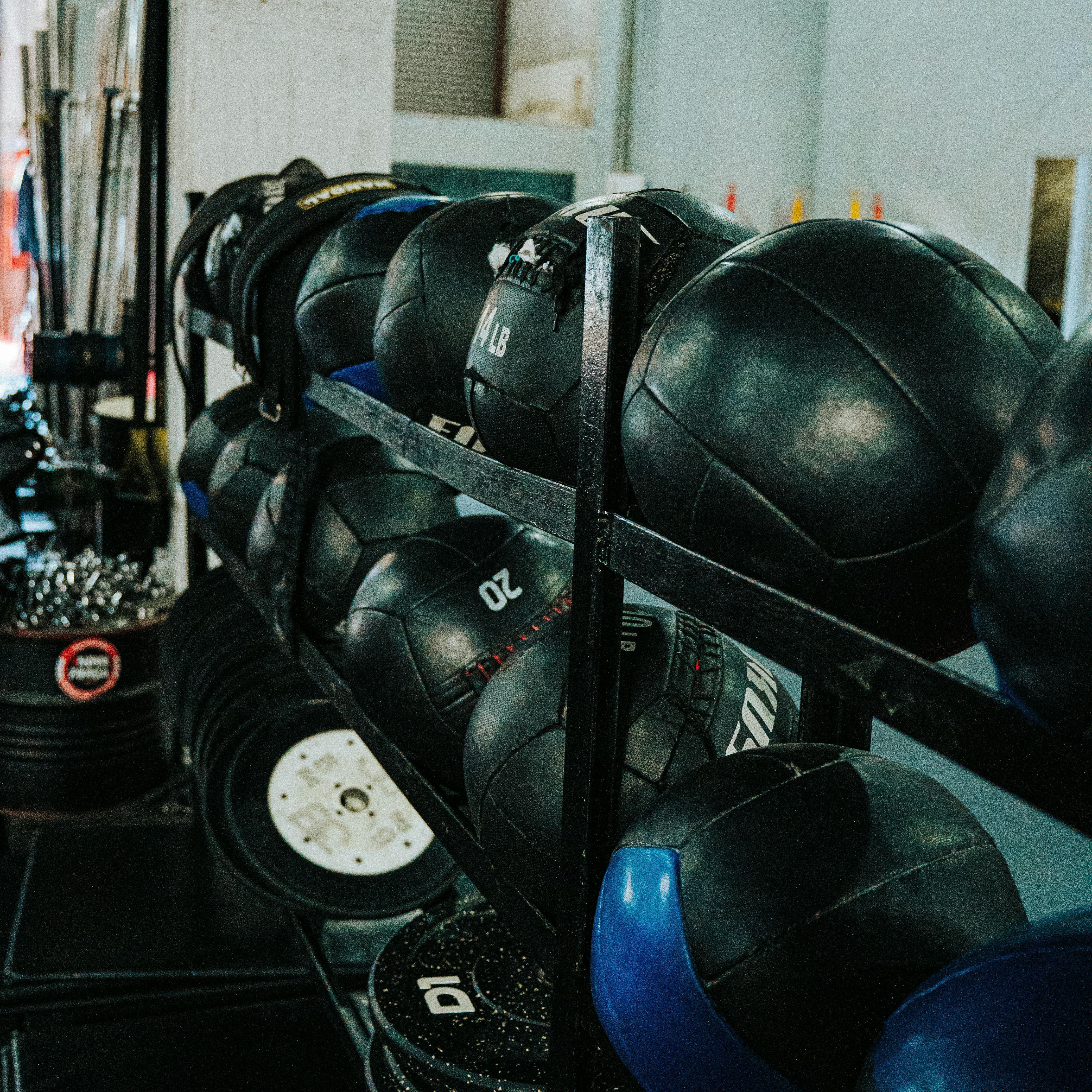 Black balls in a gym | Source: Pexels