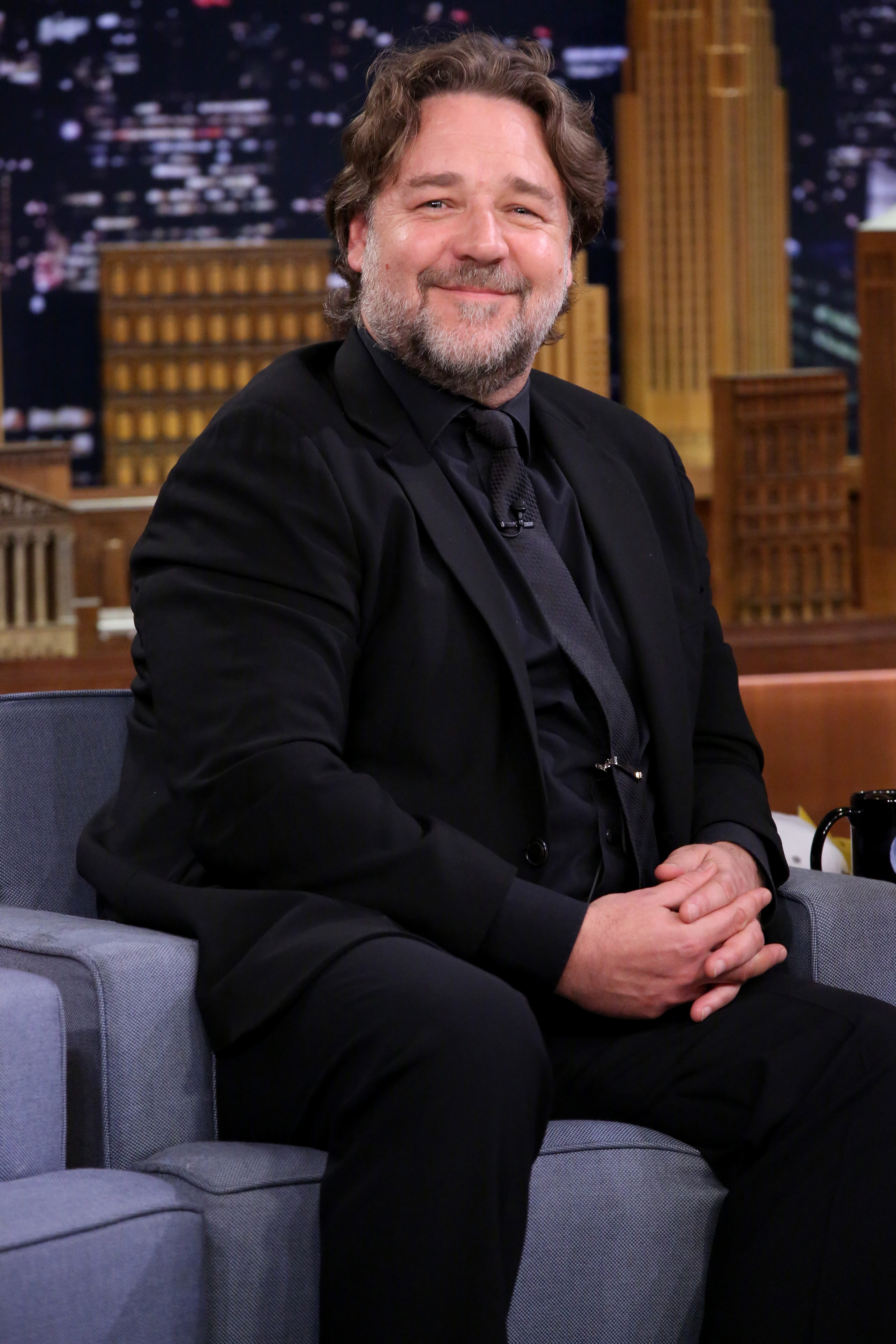 Russell Crowe sat down for an interview on "The Tonight Show Starring Jimmy Fallon" on April 22, 2015, dressed in a black suit and matching tie. At the time, the actor appeared noticeably heavier, years before he began the health-focused journey that would lead to his 55-pound weight loss.