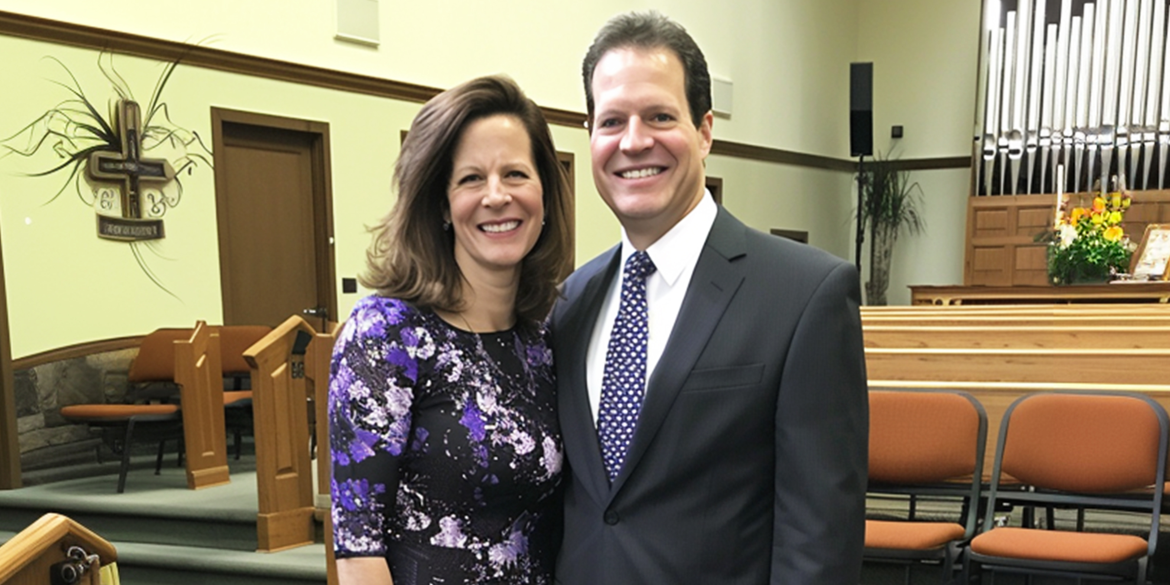 A couple standing in a church | Source: No source
