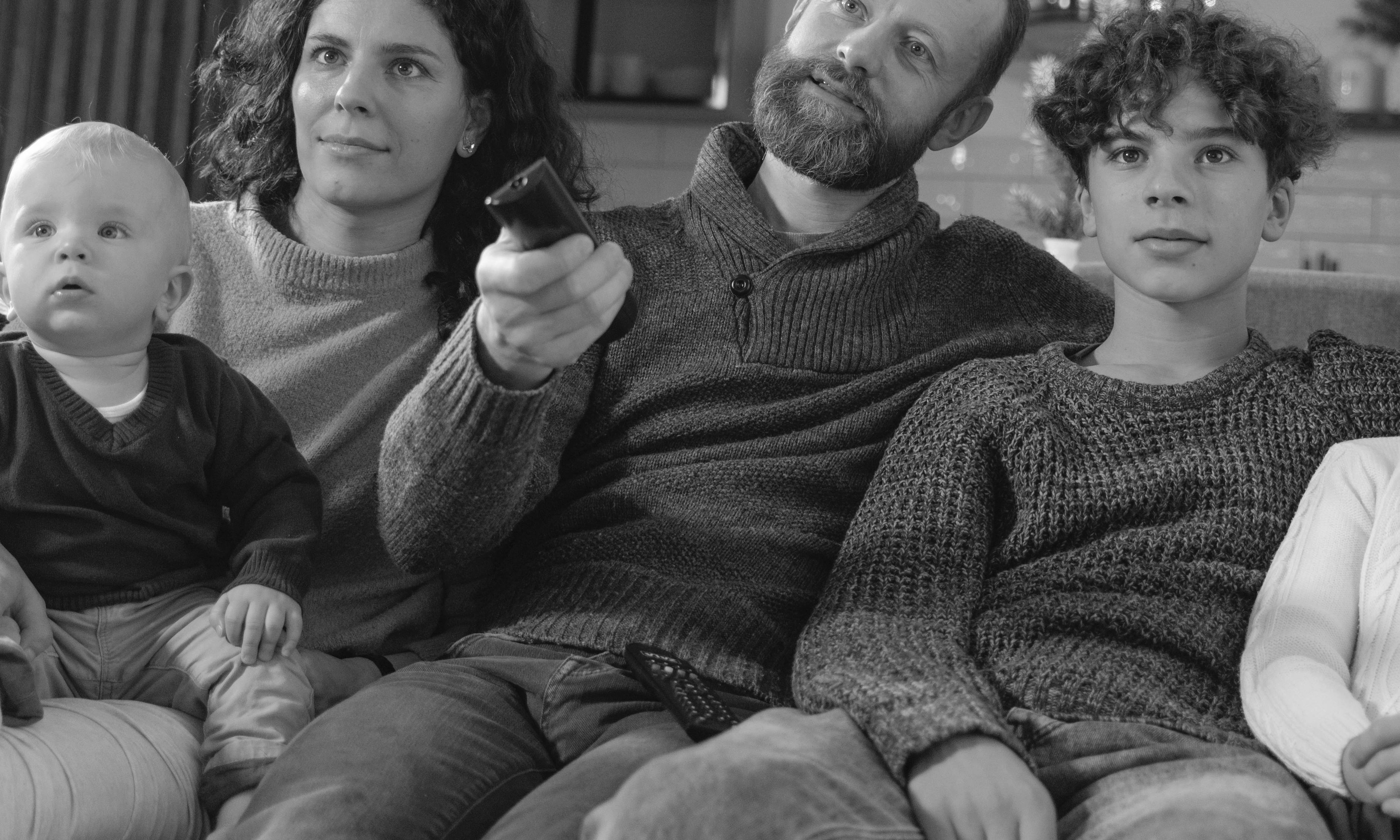 A family watching TV together | Source: no source