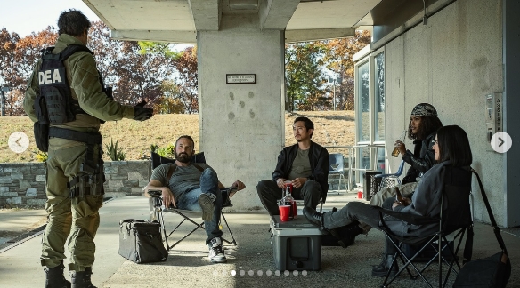 Ben Affleck and the film's narcotics team gathered outside a home during a tense scene in "The Rip." | Source: Instagram/netflixpt