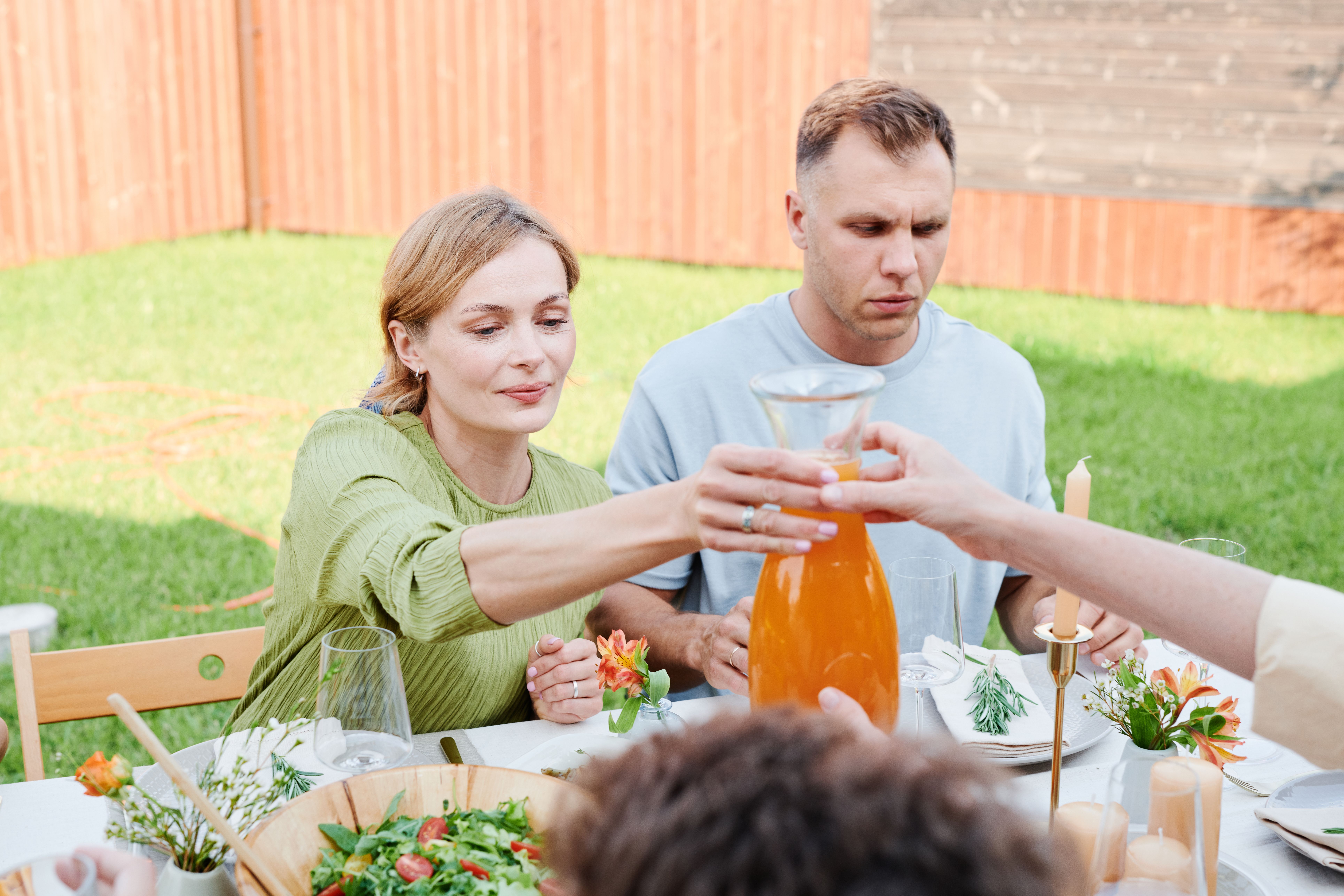 A couple celebrating outdoors | Source: Pexels
