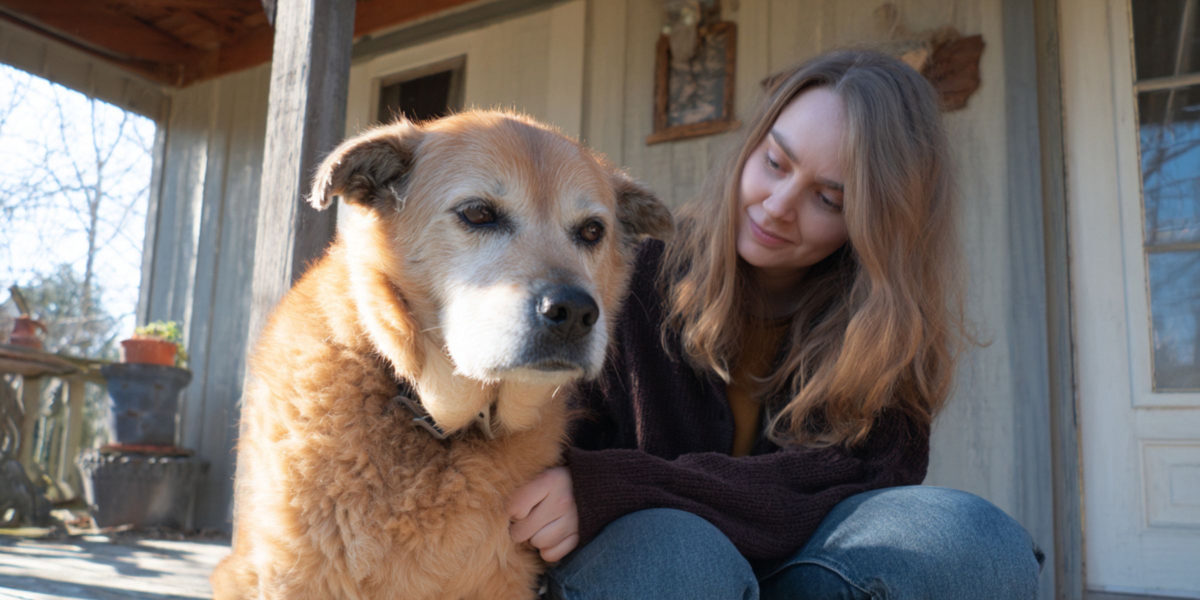 A woman and her dog | Source: No source