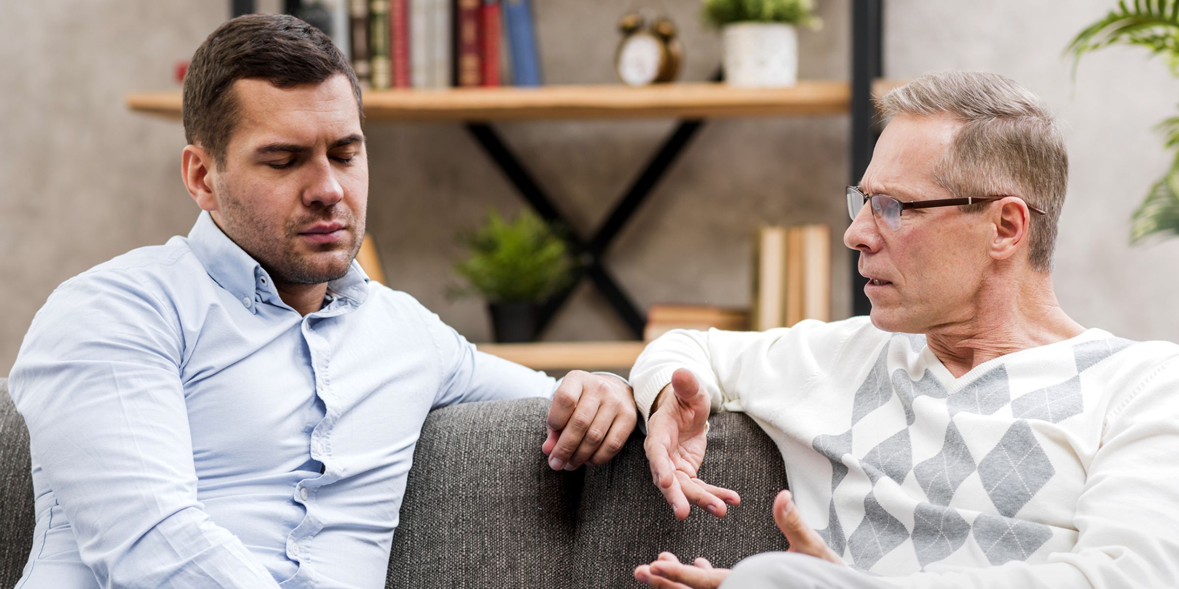 A man and his father talking | Source: Freepik