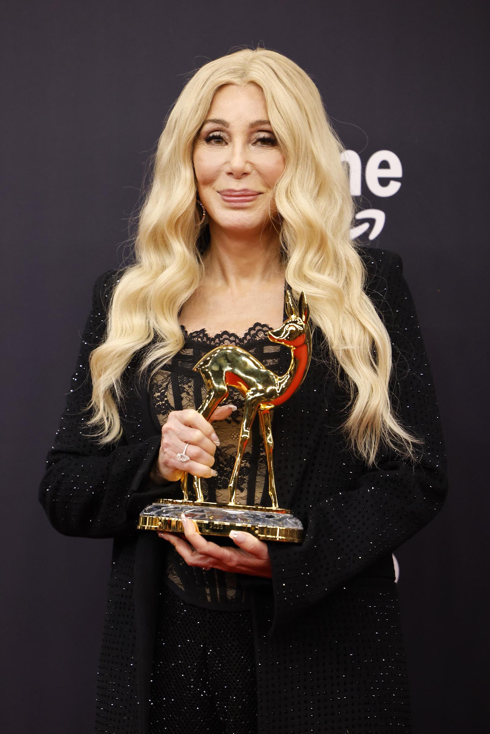 Cher poses with the "Legend" Bambi Award during the Bambi Awards 2025 at Bavaria Studios on November 13 in Munich, Germany. | Source: Getty Images