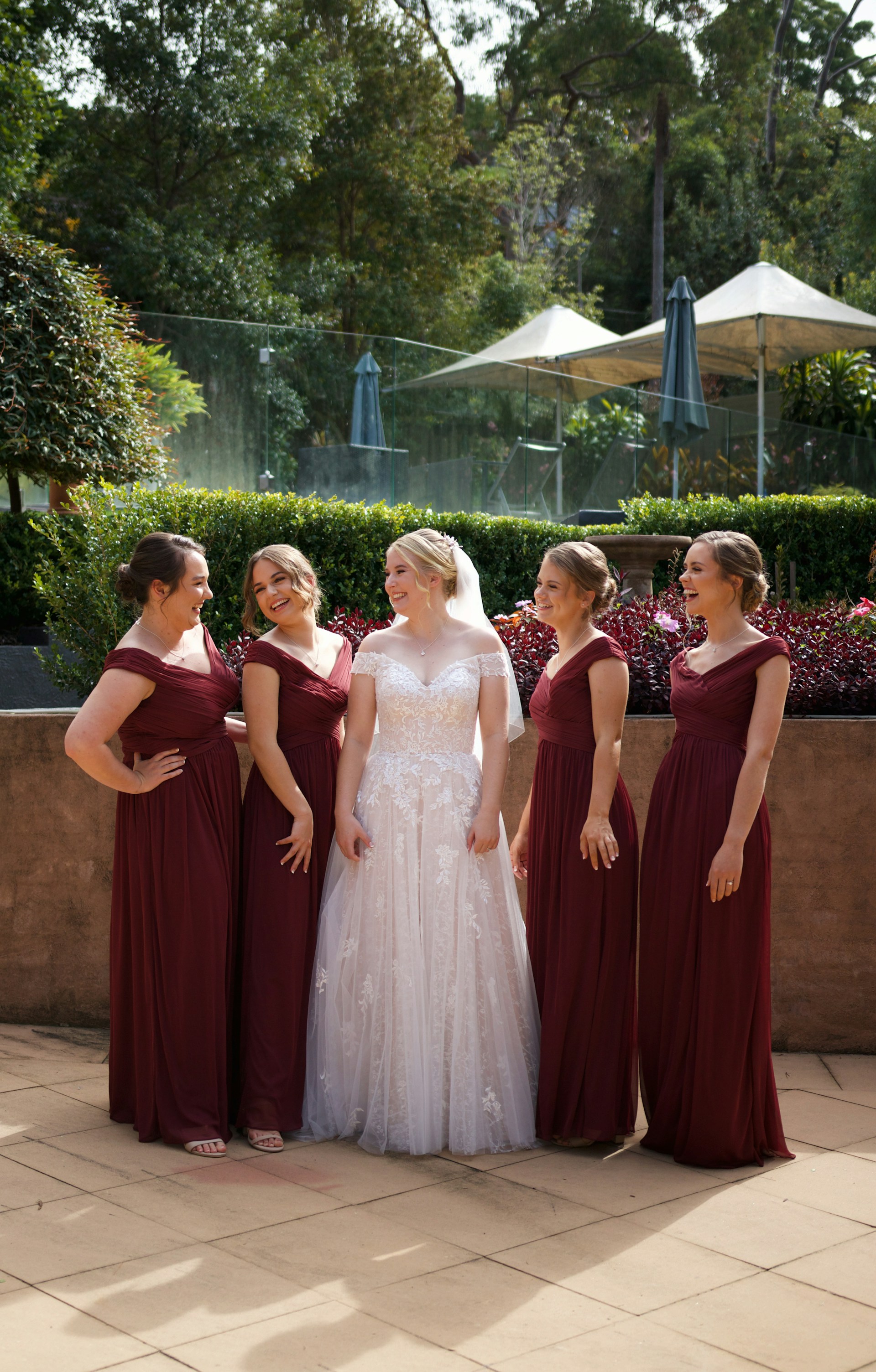 A bride standing with the bridesmaids | Source: Unsplash